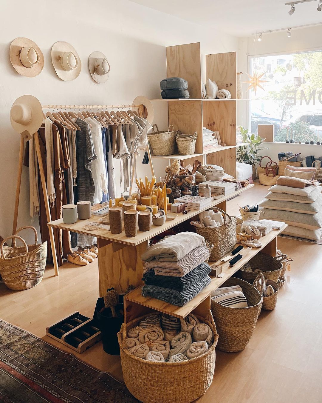 Boutique store interior with natural wood elements and textiles